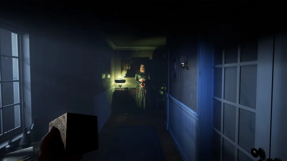 A dark interior room lit by a single window in the Labyrinth
