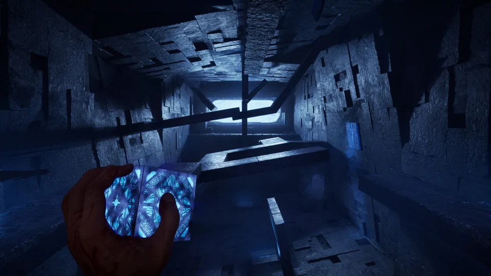 First-person view of Aidan holding the glowing Genesis Configuration puzzle box in a dark corridor