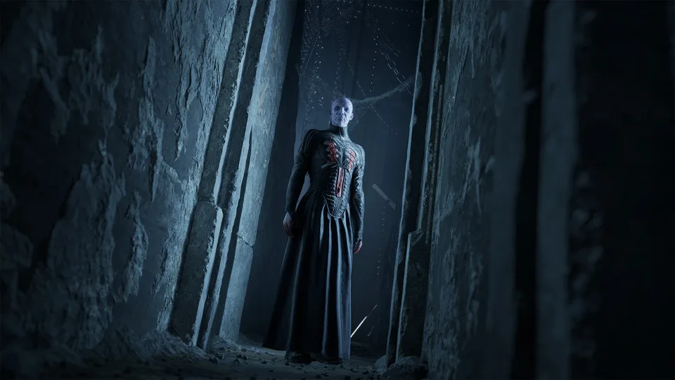 Pinhead standing in a stone corridor of the Labyrinth